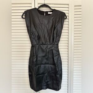 Faux leather mini dress with zipper.